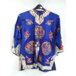 A silk embroidered Chinese jacket with figural,