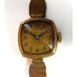 ROLEX; a lady's vintage 18ct yellow gold wristwatch,