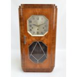 A walnut Art Deco wall clock,