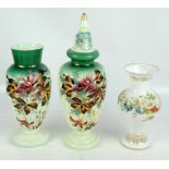 A near pair of Victorian opaque glass vases painted with floral and foliate sprays on graduated