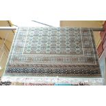 A green ground Bokhara carpet, 230 x 160cm.