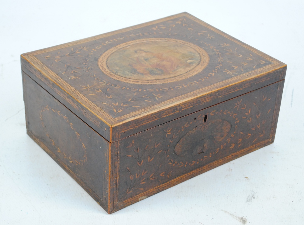 An early 19th century mahogany and inlaid work box,