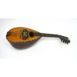 A 1920s rosewood bound mandolin inlaid with horn and tortoiseshell,