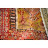 A Turkish Kilim red ground rug, 210 x 144cm.