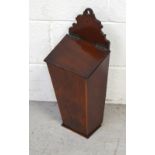 An early 19th century mahogany wall-mounted candle box with sloping hinged lid, height 49.5cm.