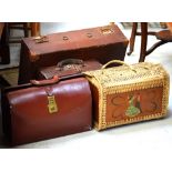 A distressed canvas suitcase, a 1970s wicker hamper (af),