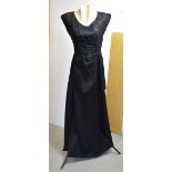 Seven vintage dresses to include a 1980s black evening dress with full taffeta skirt and lace