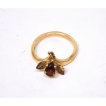 A 9ct gold wishbone ring with a small suspended pendant with central amber-coloured stone, size M,