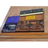 A collectors' lot to include a cased slide rule, a cased J Halden & Co geometry set,