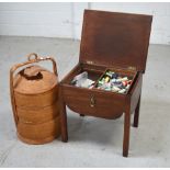 A 19th century Victorian mahogany sewing table with contents and a large wicker basket also with