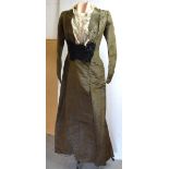A c1860 brown with black dot silk taffeta dress, lined with pale grey silk taffeta,
