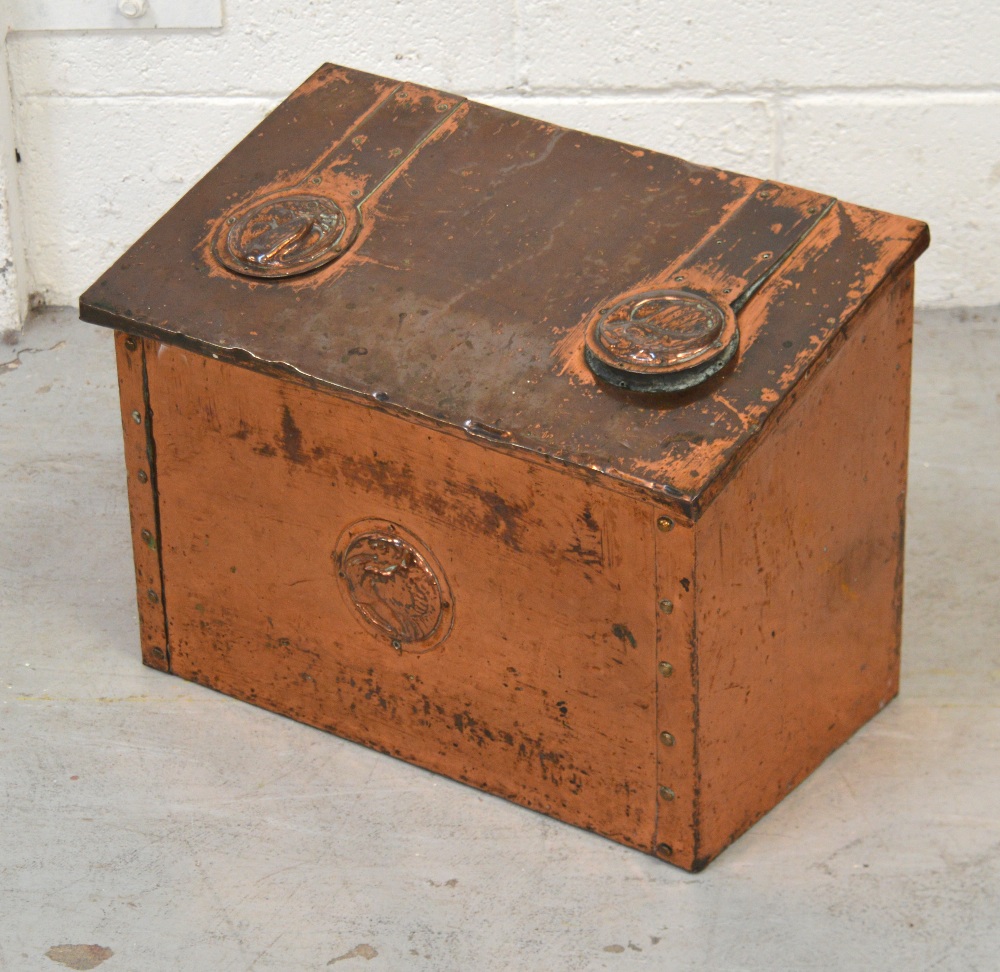 An Arts and Crafts style copper-clad coal bin with sloping hinged lid, width 48cm.
