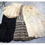 Six Victorian/Edwardian c1900 silk taffeta petticoats, to include ivory and black examples,