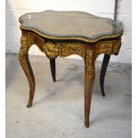 A French boule work ormolu-mounted occasional table with faux tortoiseshell inlay and cherub and