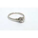 A platinum solitaire brilliant-cut diamond ring, approx 0.65ct spread, size M, approx 2.8g.