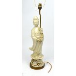 A blanc de Chine Guanyin on lotus pad lamp, height approx 60cm.