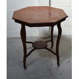 An Edwardian inlaid hexagonal hall table, stretchers leading to lower plinth, length 72cm.