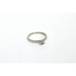 A platinum solitaire diamond ring, central stone approx 0.