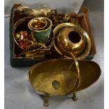 A large quantity of brassware to include a boat-shaped coal scuttle, a pair of dragon candlesticks,