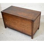 An oak carved blanket box.