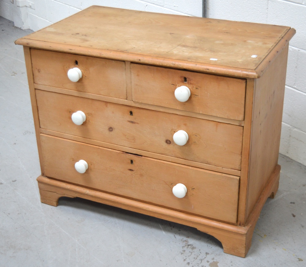 An Edwardian pine three-drawer chest of drawers on bracket supports, approx height 74cm,