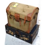 An Edwardian black metal travelling trunk with various labels to include London and North Eastern