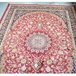 A red ground Keshan carpet, 230 x 160cm.