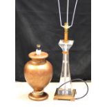 An acrylic and bronzed table lamp with cream silk shade,