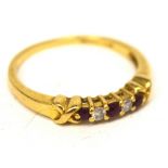 An 18ct yellow gold ruby and diamond five-stone ring, size O, approx 2.4g.