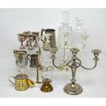 Two decanters with stoppers, two three-sconce candelabrum,