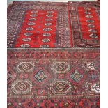 Three Persian-style red ground rugs, 135 x 67cm, 155 x 89cm and 190 x 123cm (3).