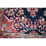 An antique Persian Mahal rug, 201 x 128cm.