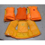 Four vintage buoyancy aids by A D Crompton Ltd, in varying sizes (4).