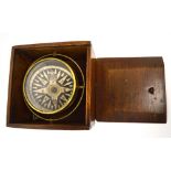 An oak-cased Berry & Mackay of Aberdeen brass ship's compass, diameter 14cm.