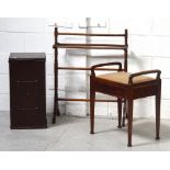 An Edwardian stained towel rail, an Edwardian inlaid mahogany piano stool on tapering support.