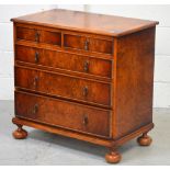 A reproduction burr maple and mahogany cross-banded chest of two short over three long graduated