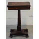 A 19th century rosewood swivel-top inlaid chess/gaming table,