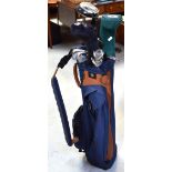 A set of ladies' King Cobra golf clubs in carrying bag.