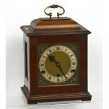 An early 20th century eight-day chiming mahogany-cased mantel clock,