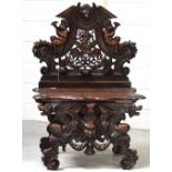 A Victorian composition mahogany and oak chair,