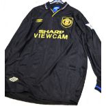 A player-worn Manchester United shirt for season 1993-1994 with 'Bruce' and number 4 to back.