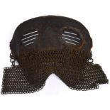 A rare WWI tank crew splatter mask - a Medieval-style leather and chainmail mask worn by pioneering