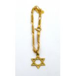 A 9ct gold link bracelet with a Star of David pendant and a filigree charm set with turquoise stone.