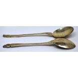 A pair of Edward VII hallmarked silver Arts and Crafts serving spoons, Samuel Jacob, London 1905,