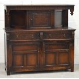 A mid-20th century Priory-style oak court cupboard,