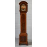 A reproduction inlaid grandmother clock, gilded and silvered dial set with Roman numerals,