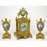 An early 20th century period French-style turquoise ceramic and gilded clock garniture,