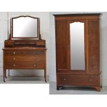 An early-to-mid 20th century inlaid mirror-door wardrobe with one large drawer to base,