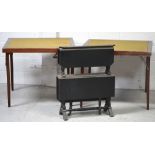 A Victorian ebonised two-tier drop-leaf table,