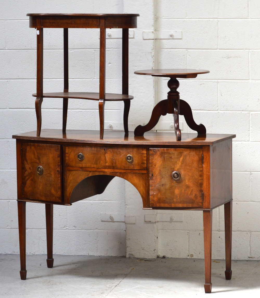 A reproduction mahogany cross-banded bow-front sideboard,